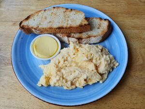 Scrambled eggs butter and sourdough.jpg